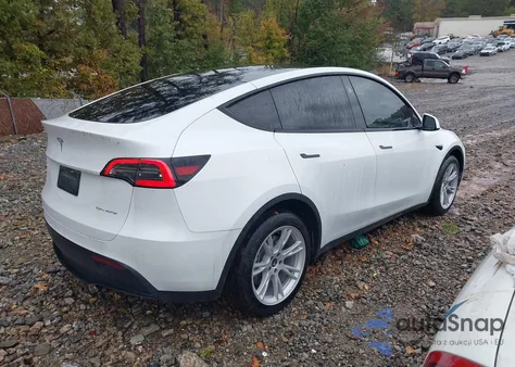 2023 Tesla Model Y Awd/Long Range Dual Motor All-Wheel Drive from USA, damaged, VIN 7SAYGDEE6PF802982